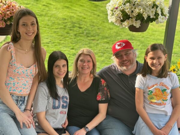 Owens family sitting together
