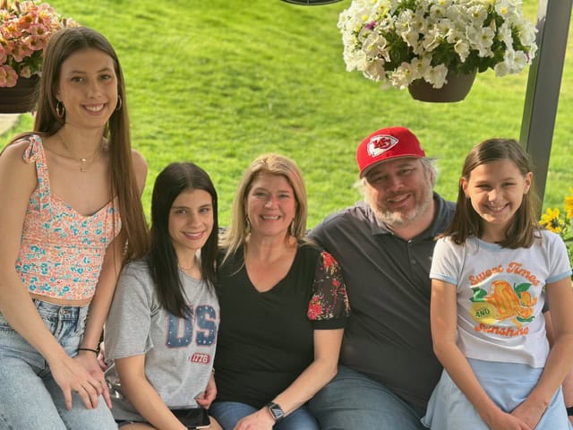 Owens family sitting together